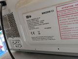 a close up of a microwave on a counter