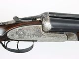 a close up of a rifle with a gun in it