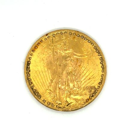 une image d'une pièce d'or sur une surface blanche