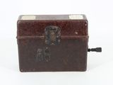 a small wooden box with a lock on it