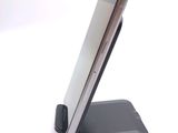 a cell phone that is sitting on top of a stand