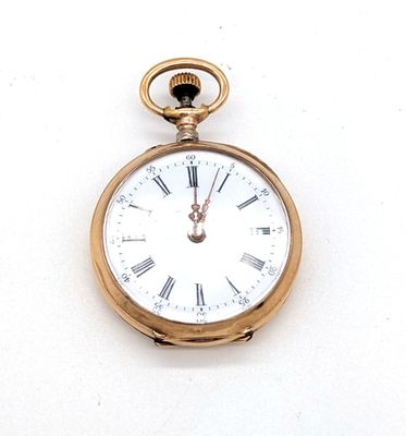 une montre de poche en or avec des chiffres romains