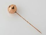 an image of a wooden stick with a ball on it