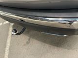 a close up of a car ' s rear bumper