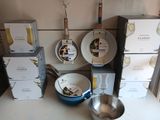 many pots and pans that are on the counter