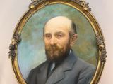 portrait d'un homme barbu dans un cadre en or