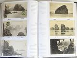 a open book with pictures of mountains and boats on it