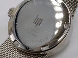 an image of a close up of a wrist watch on a table