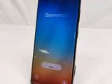 the back of a black samsung note 8 with a blue screen