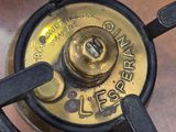 a close up of a gas burner on a table