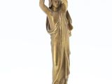 bronze statue of a woman holding a child on her shoulders
