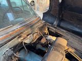 an old car that has been rusted and needs repair