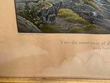 a picture of a picture of a mountain scene in a gold frame