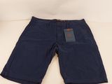 the children ' s shorts are blue and have a tag on it
