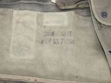 a close up of a bag with a tag on it