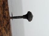 an image of a close up of a pole on a beach