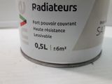 a can of radiateurs sitting on a table