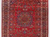 un tapis rouge orné d'un médaillon