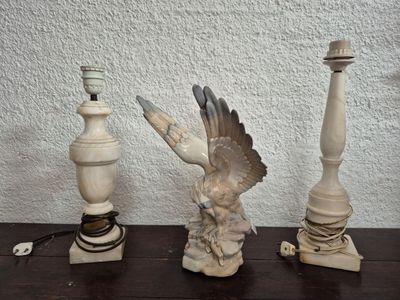 three candles that are sitting on a table