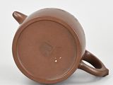an image of a brown cup with a handle on a white surface