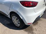 a white car that is parked in a parking lot