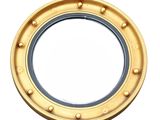a gold porthole with rivets on a white background