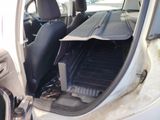 a picture of the inside of a car with the door open