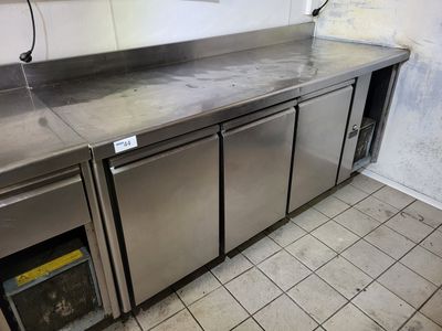 a stainless steel counter in a commercial kitchen