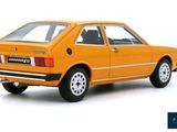 an orange car is parked on a white surface with a white background