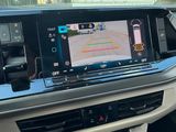 the interior of a car with a gps device on the dashboard