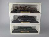 a display case with a train set on top of it