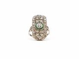 an emerald and diamond ring