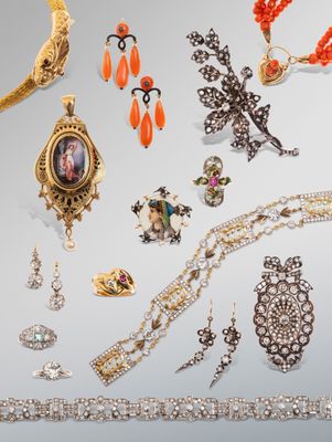 an assortment of jewelry including necklaces, bracelets, and brooches