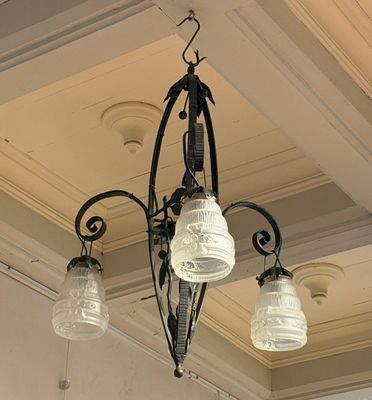 a light that is hanging from the ceiling in the room