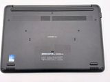 a close up of a laptop on a white surface