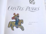 un livre avec l'image d'un homme à cheval