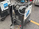 a machine that is sitting in the middle of a parking lot
