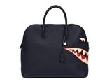 a sharky handbag with a zipper on the front and a sharky mouth on the side