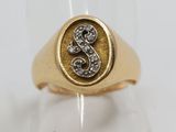 an image of a gold and diamond ring with the letter s on it