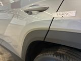 a sticker on the side of a car that has a sticker attached to it