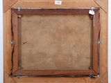 an old wooden picture frame with a piece of paper on top of it