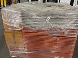 boxes of appliances are stacked on top of each other in a warehouse