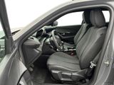 the interior of a car with the door open and the driver ' s seat down
