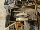 a pile of old tools sitting on top of a table
