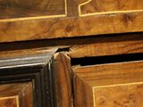 a picture of a close up of a wooden cabinet