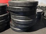 a lot of black plates stacked on top of each other