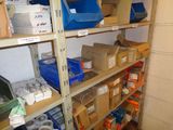 many boxes and boxes on the shelves in the room