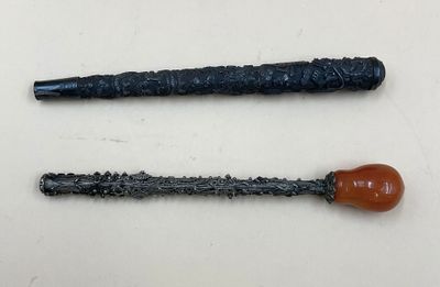 une image représentant deux baguettes posées sur une table
