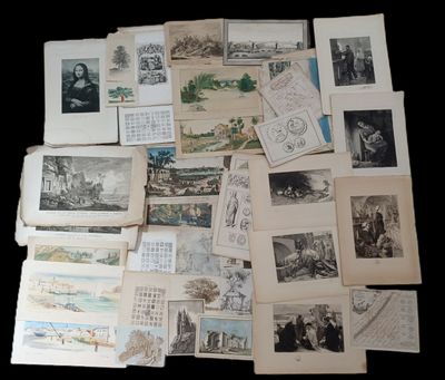 a lot of old postcards on a black table