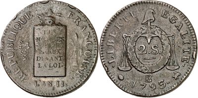 a silver coin with a picture of a man on it